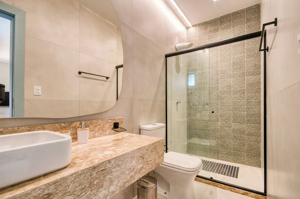 Modern guest bathroom with glass shower