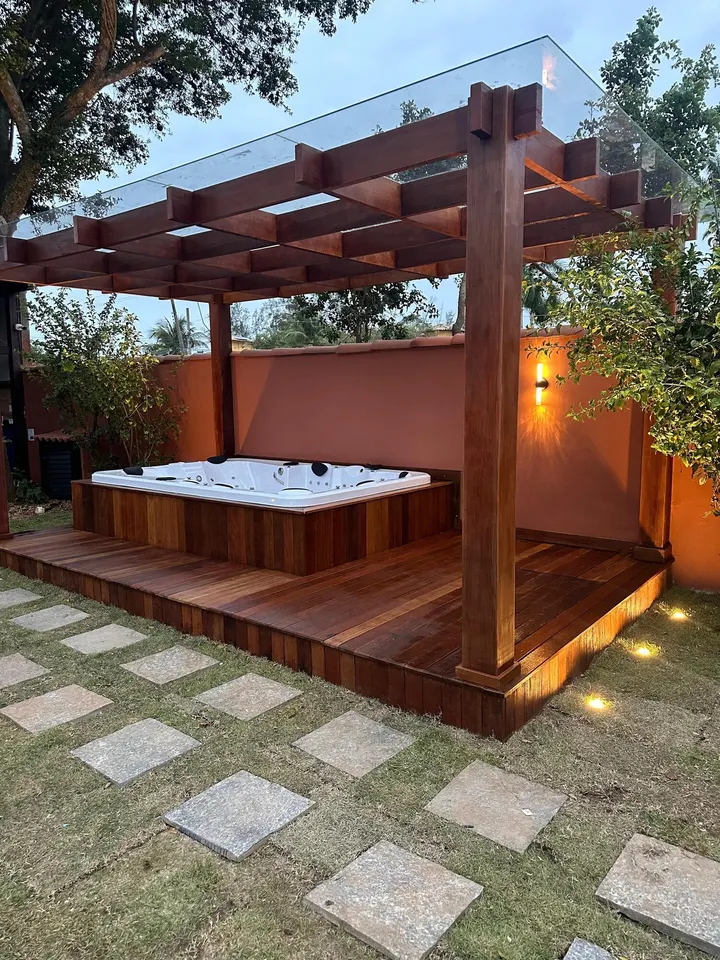 Outdoor hot tub softly lit in the evening