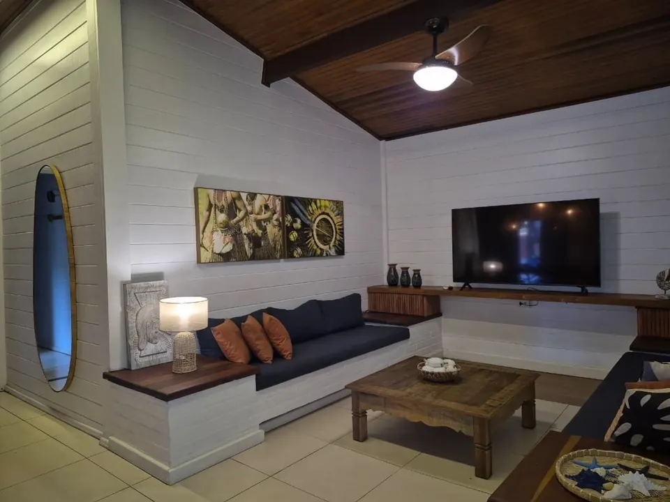 Indoor TV lounge with built-in couch seating